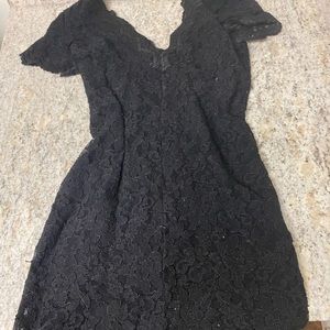 Black lace body con dress